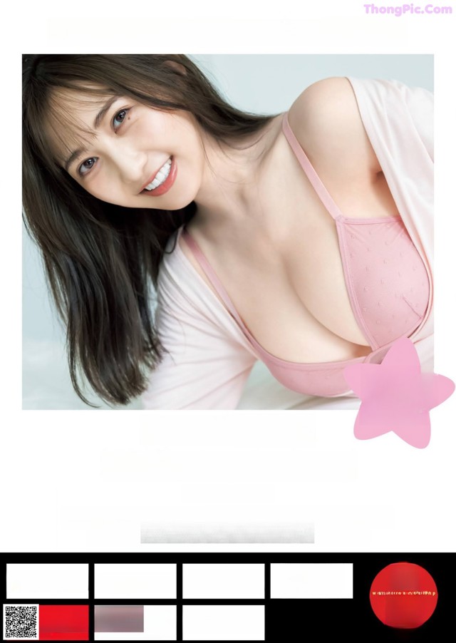 A woman in a pink bra is posing for a picture.